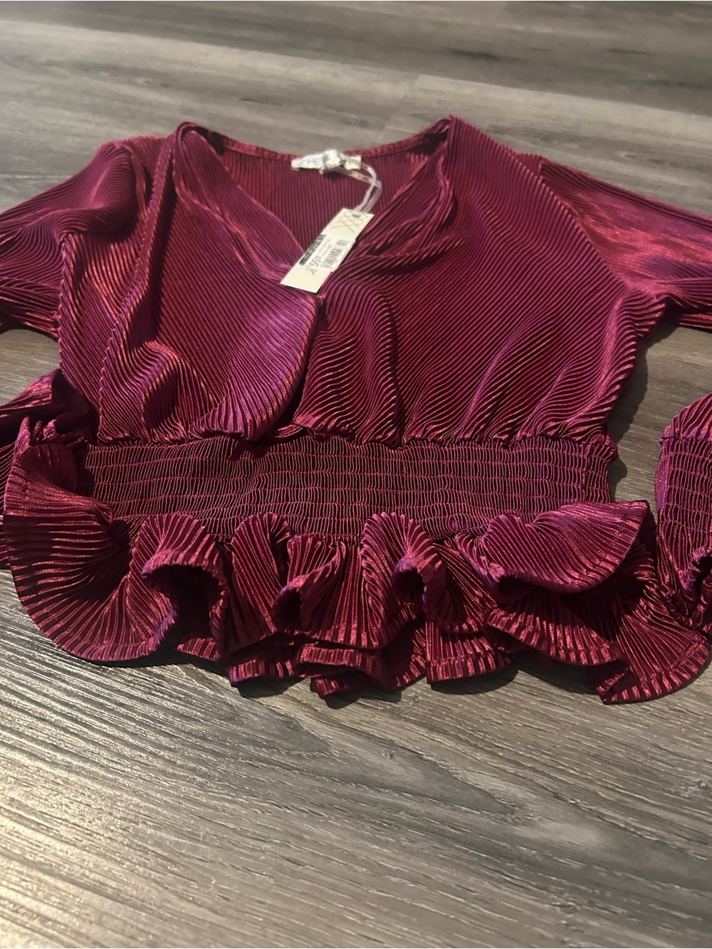 Women's V-Neck Ruffled Peplum Top in Deep Berry